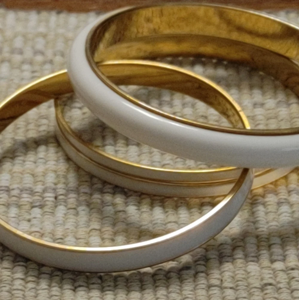 Vintage Set of Monet White & Gold Bangles